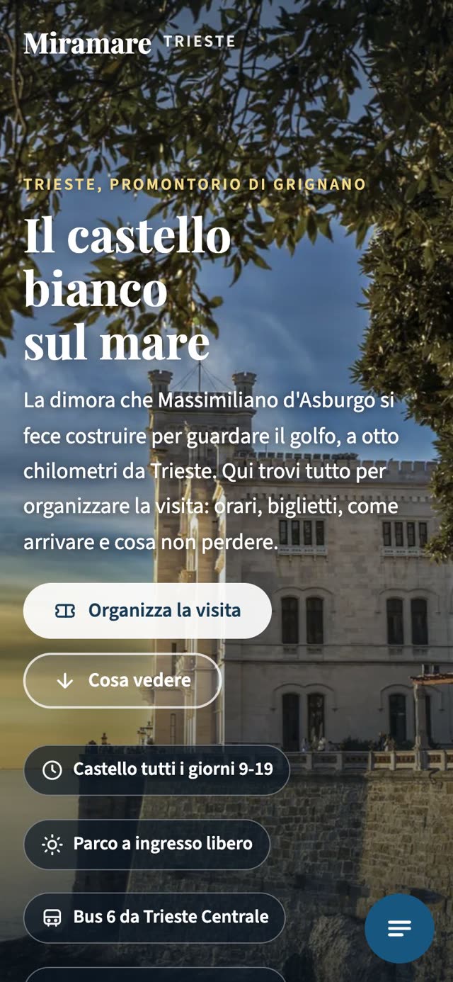 La prima schermata della versione Fable da telefono: la foto verticale del castello, il titolo, i due bottoni e le pastiglie con orari, parco a ingresso libero e bus da Trieste Centrale